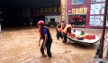 Κίνα: Αγώνας από πλημμυροπαθείς για διάσωση των περιουσιών τους